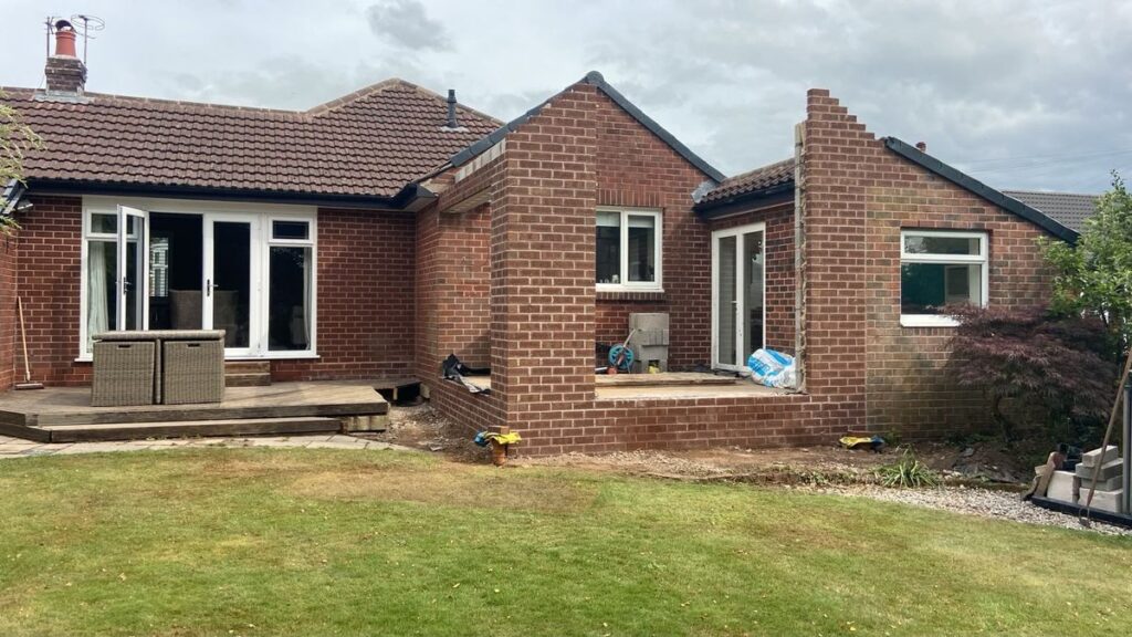 Brick extension added to a bungalow by J&L Construction