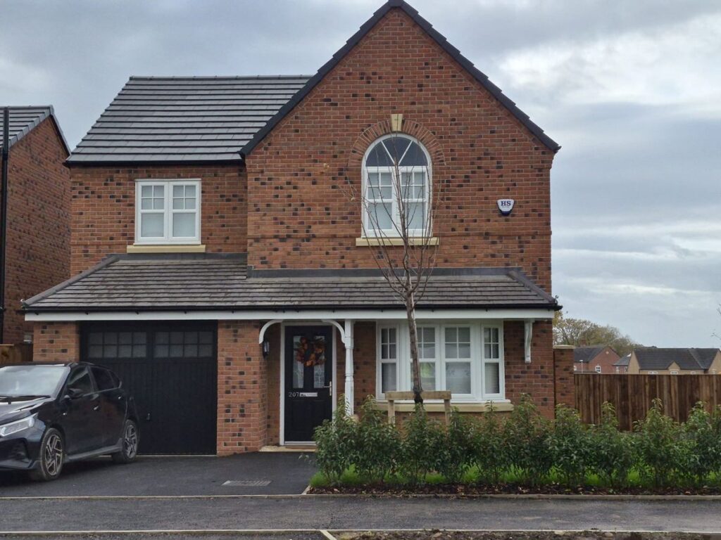 Four-bedroom new-build house with feature brickwork, built by J&L Construction North West