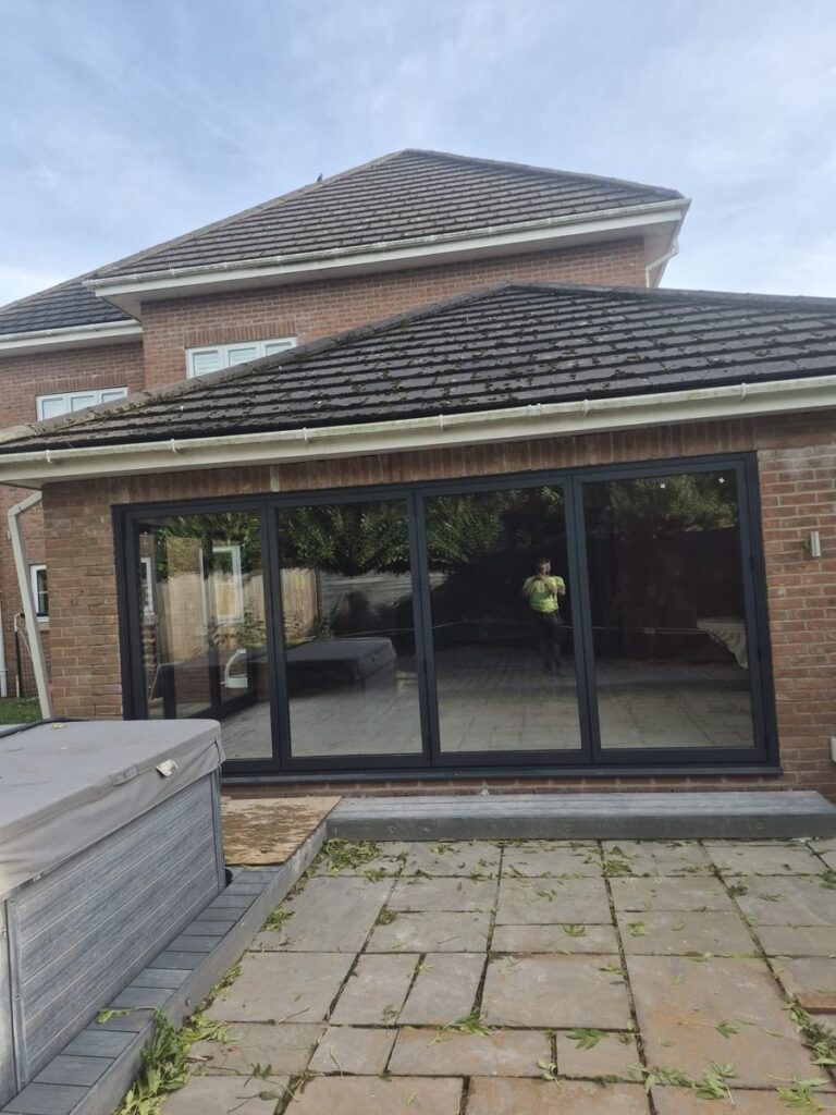 Finished rear extension with bi-fold doors, built by J&L Construction